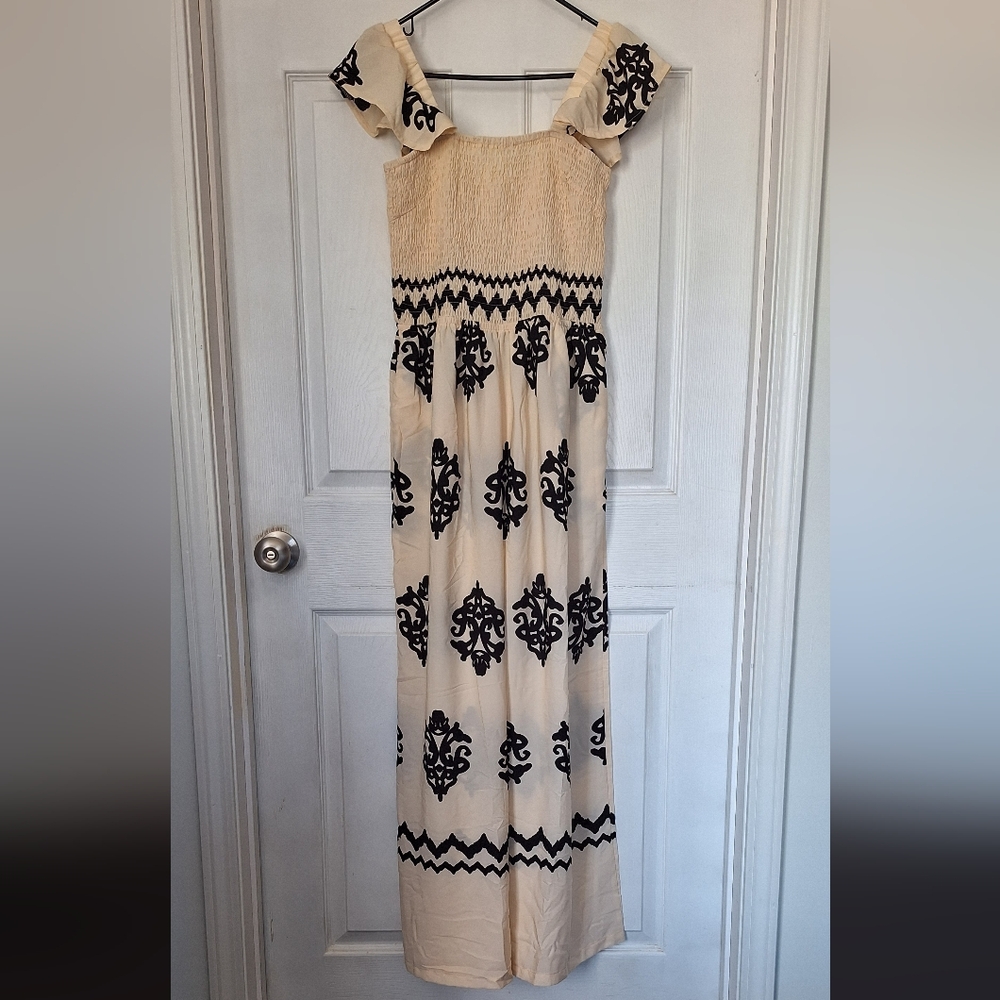 Jumpsuit Cream And Black Smocked With Ruffle Shoulders